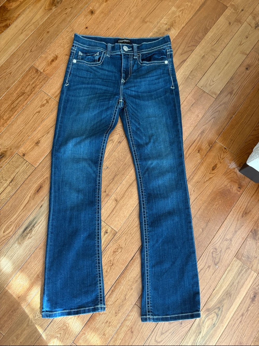 Express Barely Bootcut Jeans in Dark Blue Wash. mid rise